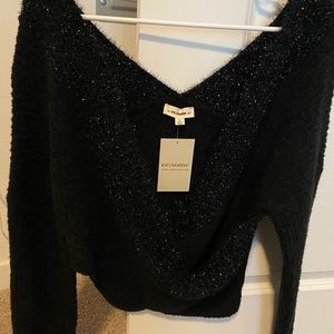 EE.Some small wrap sweater with sparkle detail. New! Perfect condition